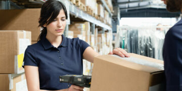Envato Elements - Warehouse workers using barcode scanner on box in distribution warehouse - TechNewsToday.co.za